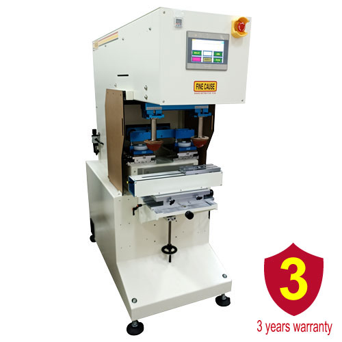 Two color pad printing machine with type shuttle table