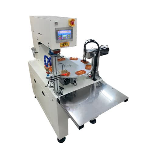 Rotary table pad printing machine with automatic output