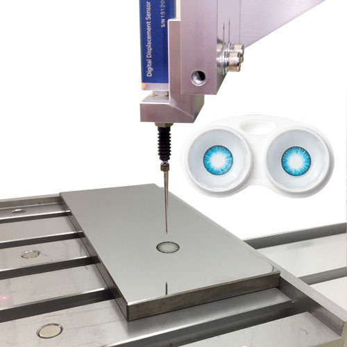 Laser engraving machine for contact lens printing